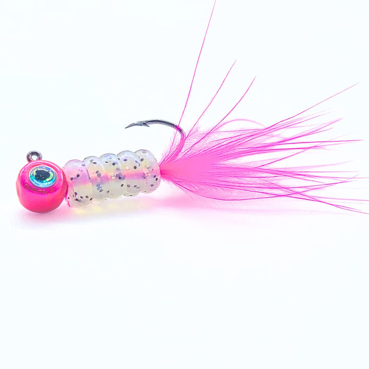 Hand tied Crappie jig, jelly belly jig with a monkey milk colored soft plastic body and a pink marabou tail. The 3D eye Crappie jig head is custom painted with Alewive powder paint . The Crappie jig is Hand tied on a mustad sickle hook by Ramble tamble tackle