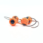 Crappie jig head with 3d eyes. Powder coated Blaze orange with black glitter cast with a #4 mustad sickle hook.