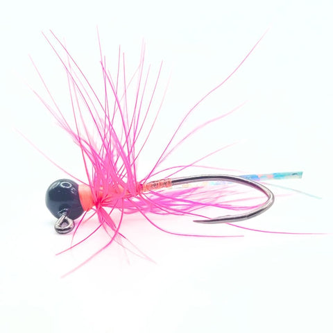 Hand tied Bluegill and Crappie jig. Tied with a pink rooster hackle feather onto a white jig head with a Mustad sickle hook by Ramble Tamble Tackle Company