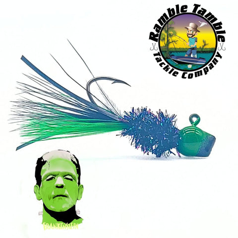 Hand tied Crappie jig with black body and green and black marabou tail. This crappie jig has a green and black hatchet jig head on a #4 sickle hook tied by ramble tamble tackle