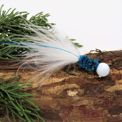 Hand tied Crappie jig featuring a Round White jig head,new age chenille body in mahi blue, white marabou tail and silver flash. Hand tied onto a #4 Mustad sickle hook by Ramble Tamble Tackle.