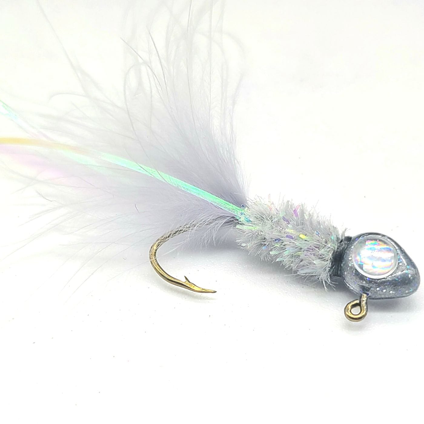 Hand tied Crappie jig featuring a custom Ghost gray minnow head, irrodescent  3D eyes, Grey Ghost body chenille, Gray marabou tail, and pearl flash. Hand tied onto a #4 Mustad sickle hook by Ramble Tamble Tackle.
