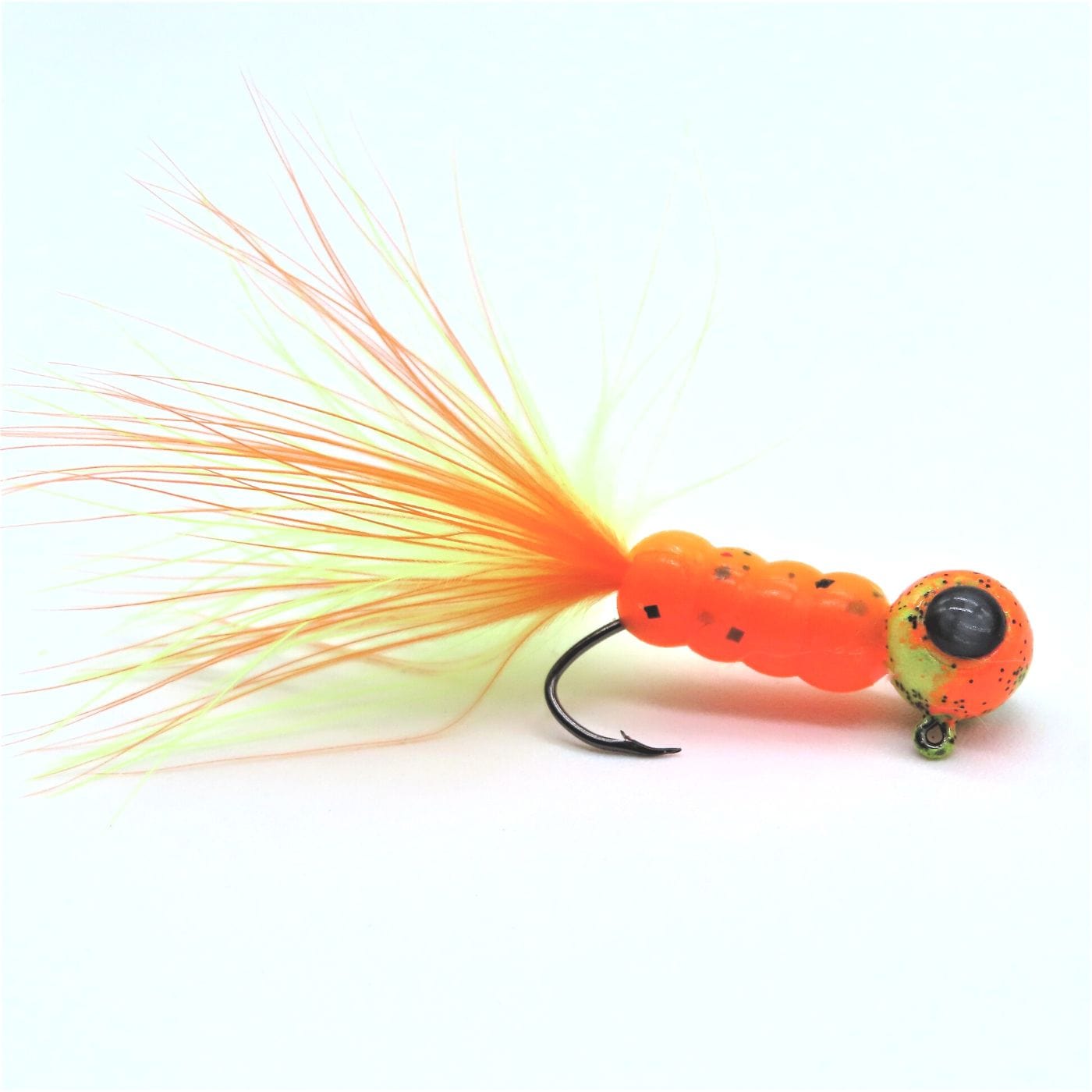 Hand tied Crappie jig, jelly belly jig with a cajun cricket soft plastic body and a 2 tone yellow/orange marabou tail. Head is custom painted with yellow/orange Pro tec powder paint with black 3D eyes. Hand tied on a mustad sickle hook by Ramble tamble tackle.