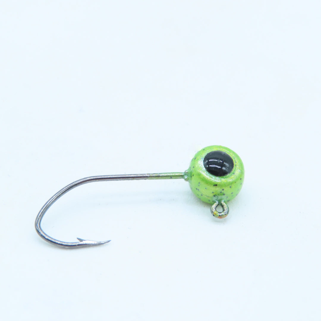 Crappie jig head with 3d eyes. Powder coated chartreuse pepper color and  cast with a #4 mustad sickle hook.